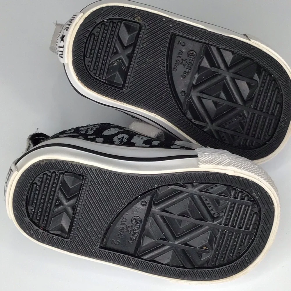 Converse Chuck Taylor All Star 2V Black and Gray Leopard Print Sneakers.